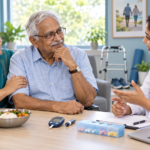 Older Indian adult and family member discussing individualized diabetes care with a clinician